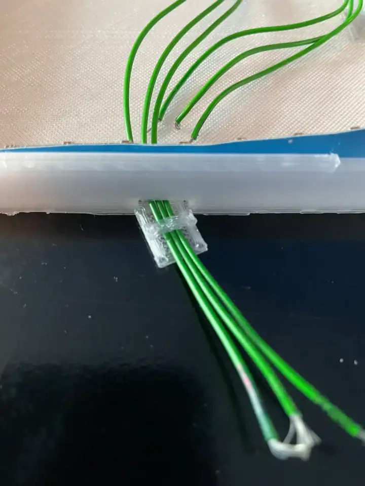 The wires pulled through a connector